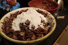 Pour as much powdered sugar as you like on top of the chocolate-Chex mixture. (photo: Nikki Dulay)